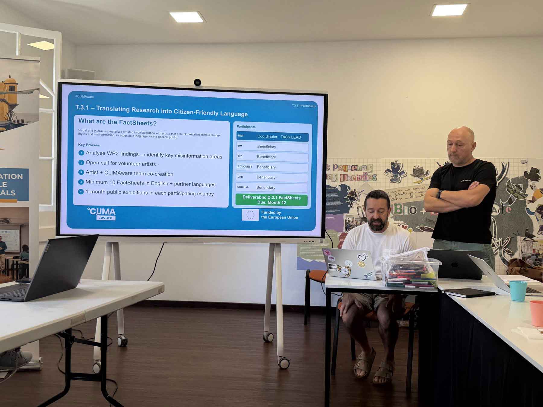 A CLIMAware partner presenting the Climate Change FactSheets during a project meeting